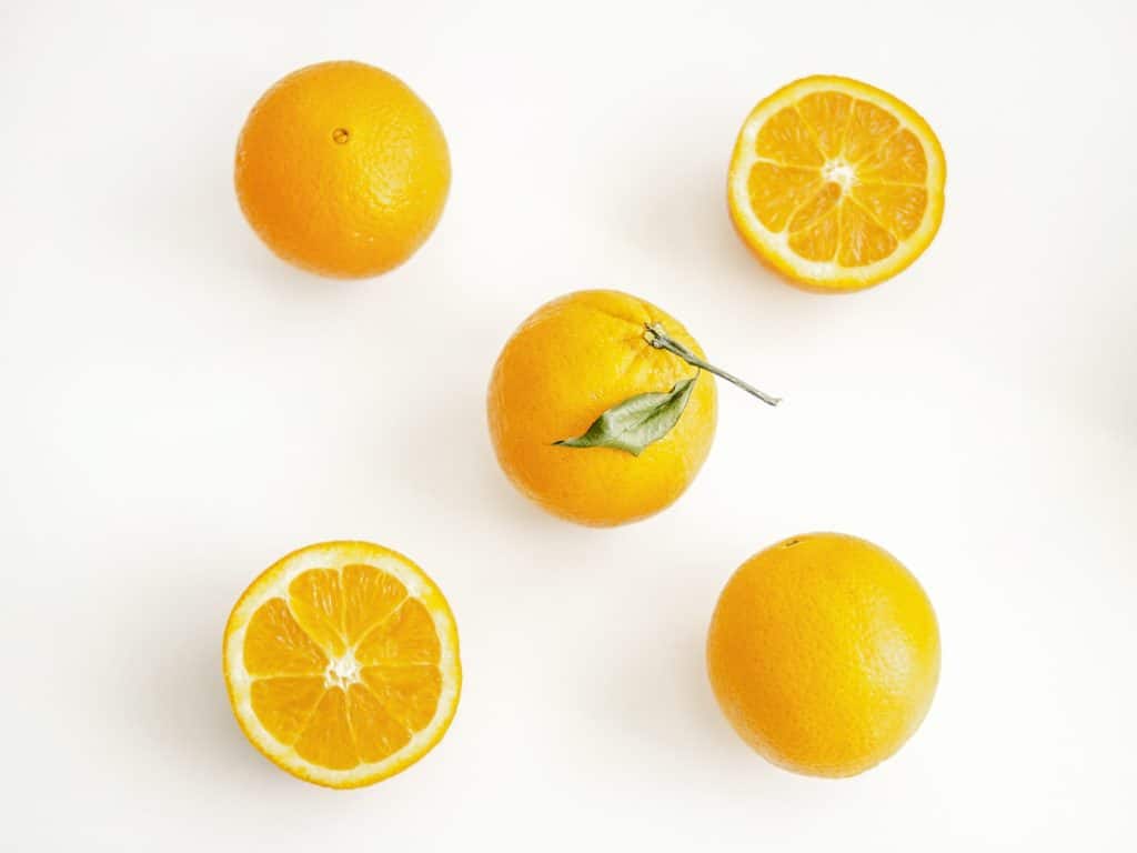 Oranges On White Surface