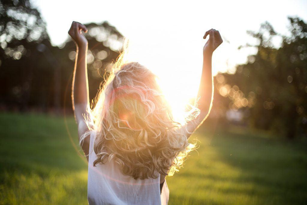 Woman In Grassy Field, Sunny Summer Weather