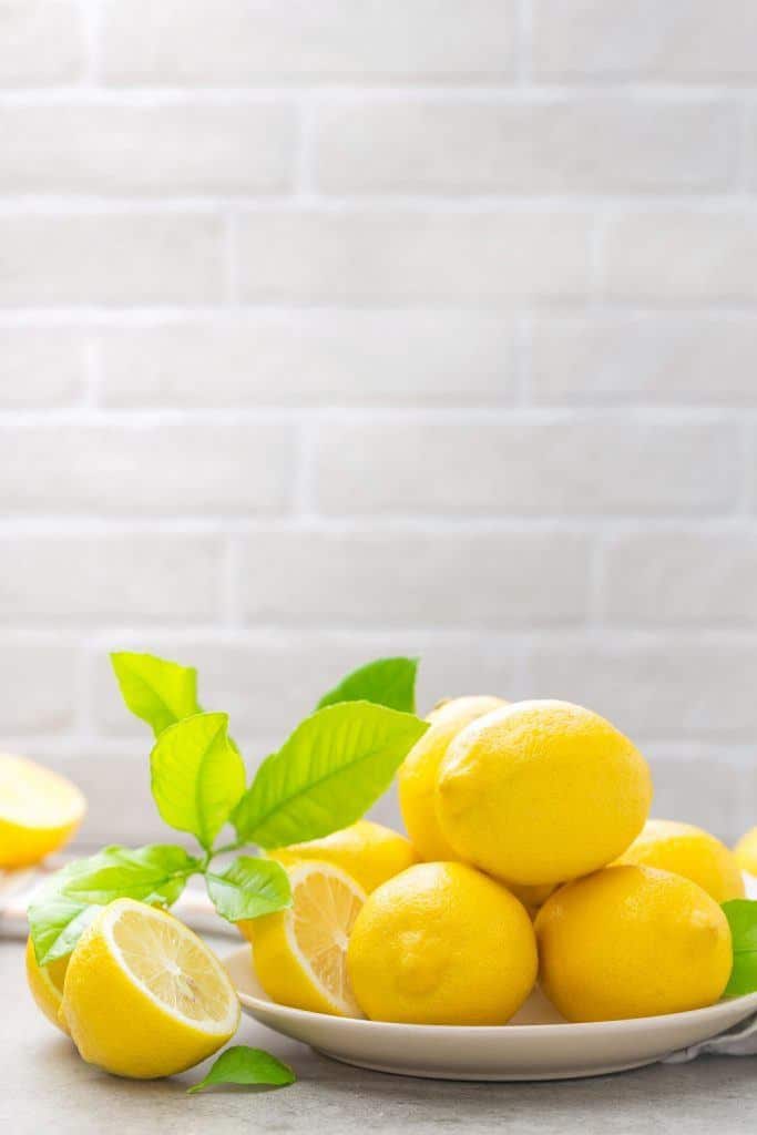 Fresh Lemons With Lemon Leaves J4B32Tk E1575999517379 683X1024 1 - Essential Oils For Energy
