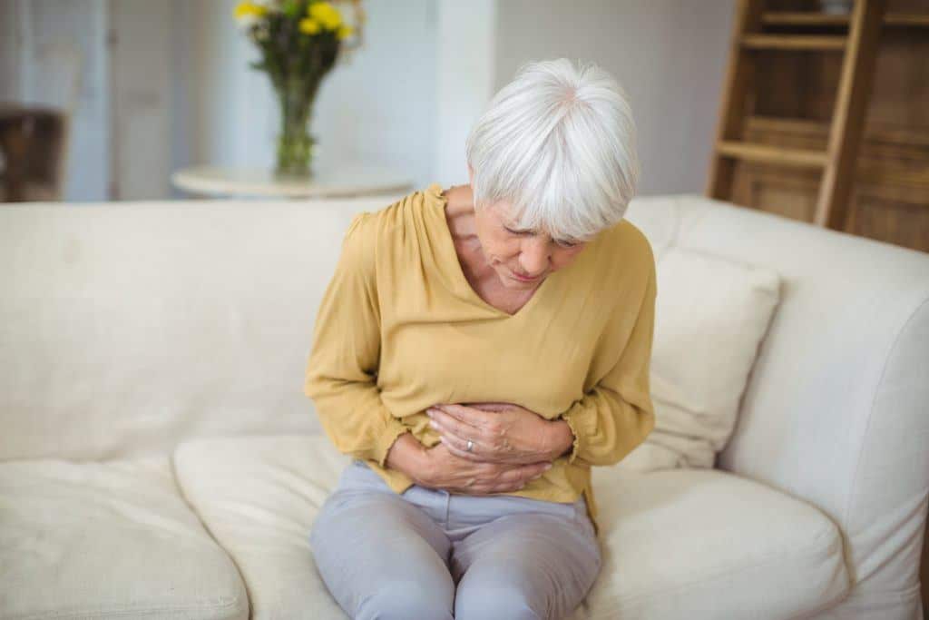 Senior Woman Suffering From Stomach Pain In 8Vt2Bwc 1024X683 1 - Essential Oils For An Upset Stomach